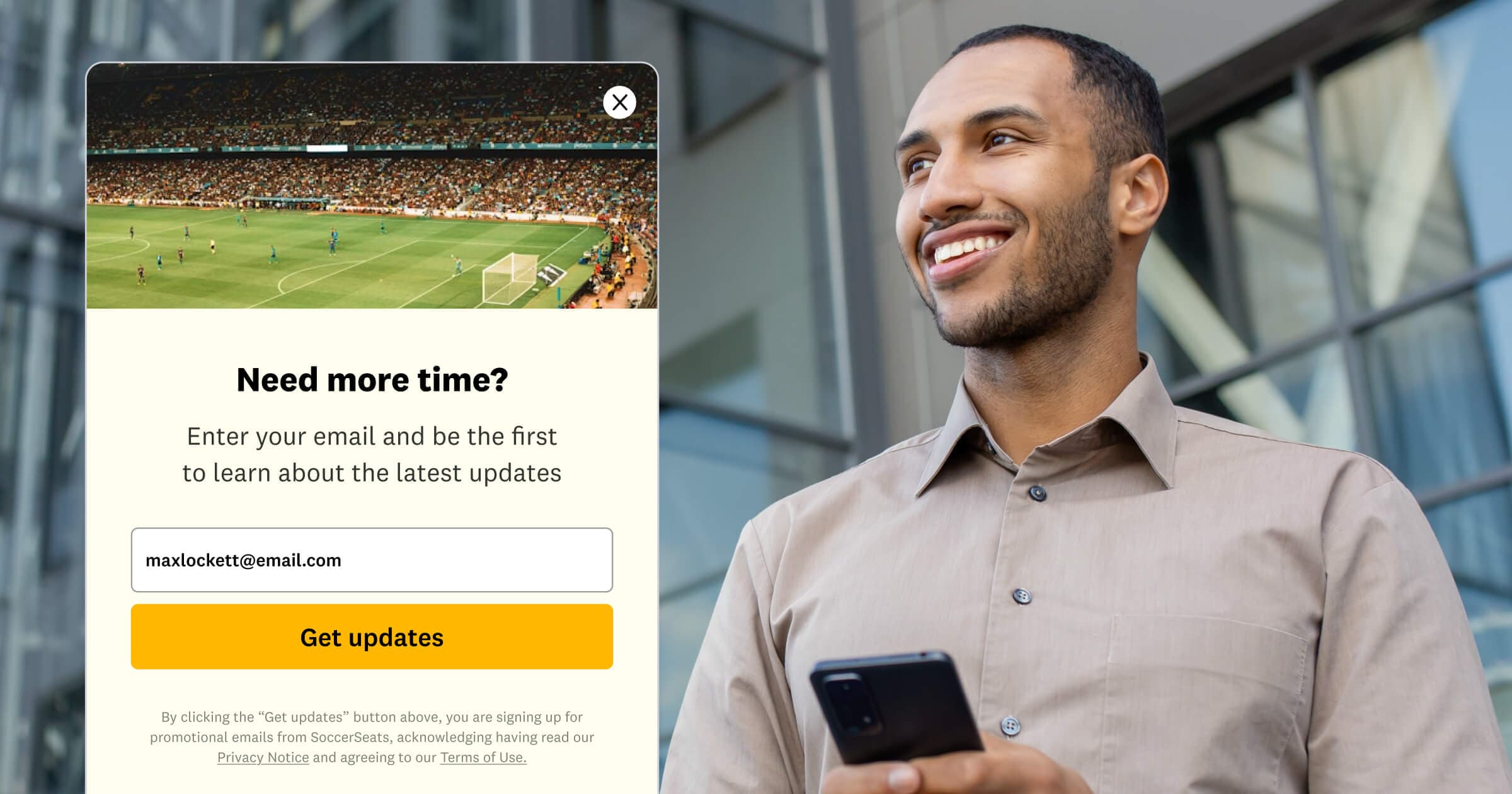 Pop-up form asking for an email address to get updates, next to smiling man holding a phone outside a building.
